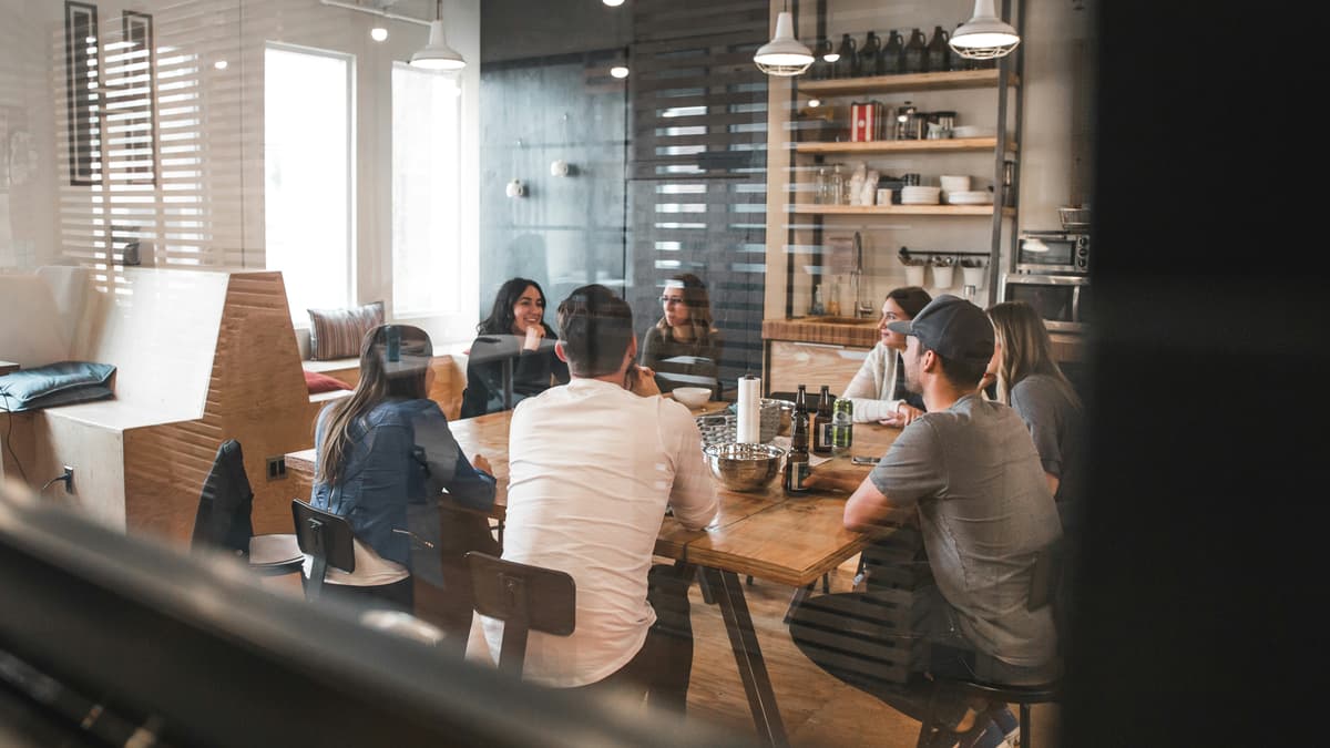 Qvian Suite team collaborating in modern office environment